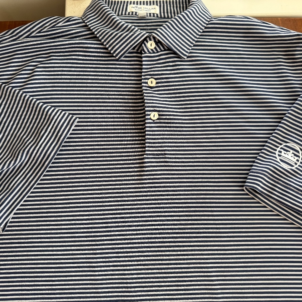 Peter Millar Navy & Grey with Peter Millar Crown on the sleeve.
